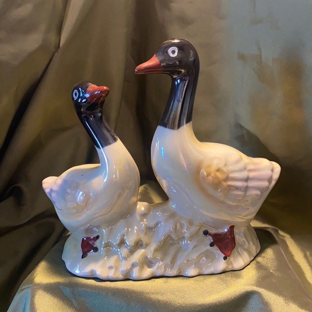 Lustre ware ducks.